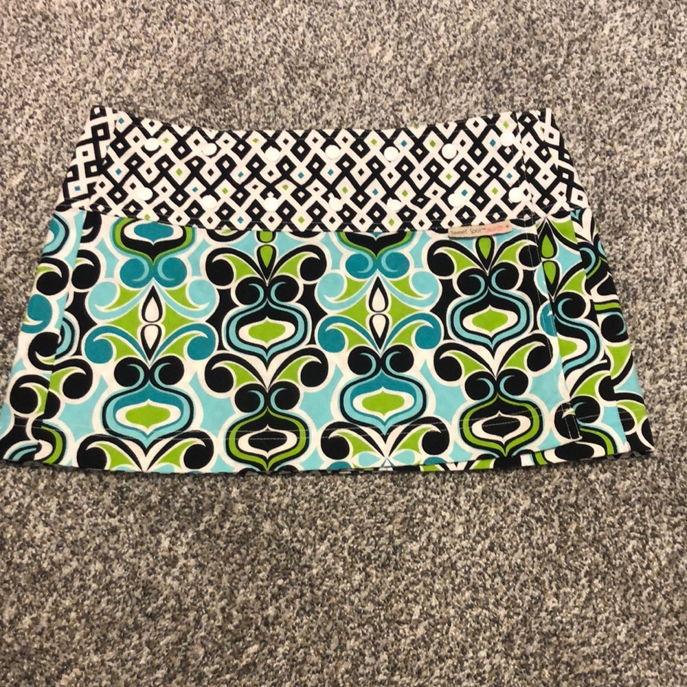 Sweet Spot Skirts.  Reversible adjustable Athletic skirt. Can fit many sizes.
